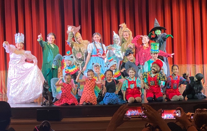 Children performing on stage at Hawaii Children's Theatre